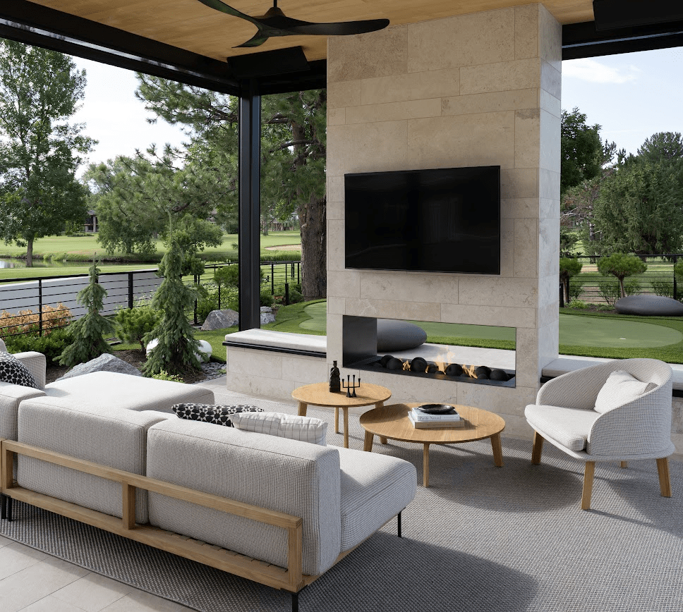 An outdoor patio with a TV and chairs