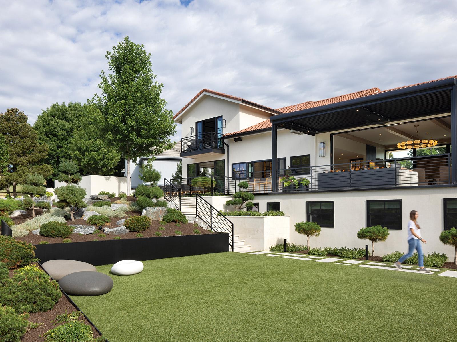 Backyard Japanese-inspired garden with manicured lawn